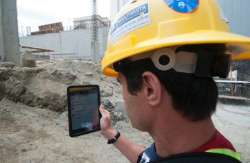 Site worker doing construction photography by Multivista