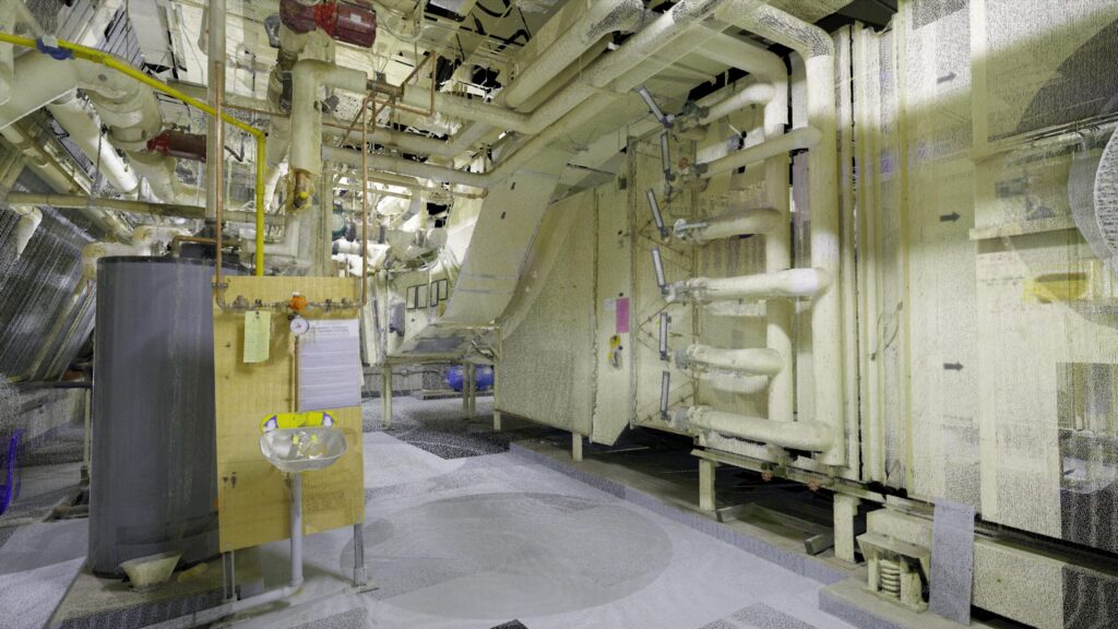 Point cloud rendering of an industrial utility room with extensive piping, machinery, and an emergency eyewash station.
