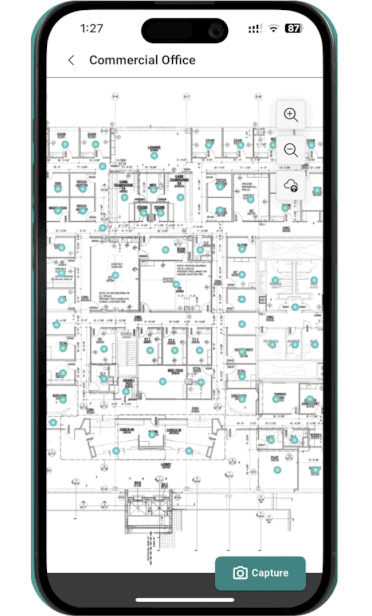 Mobile app screen showing a detailed commercial office floor plan with blue markers; Capture button at bottom-right.