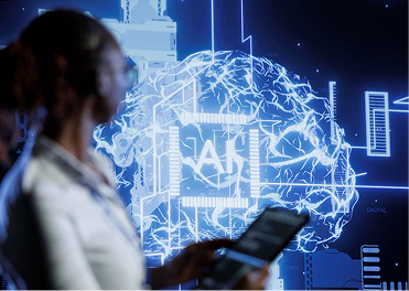 Woman viewing large screen with glowing digital brain and "AI" at its core.