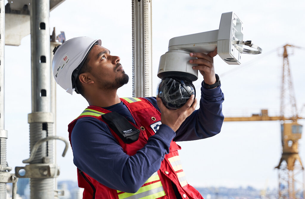 Multivista technician installing a construction webcam for reality capture