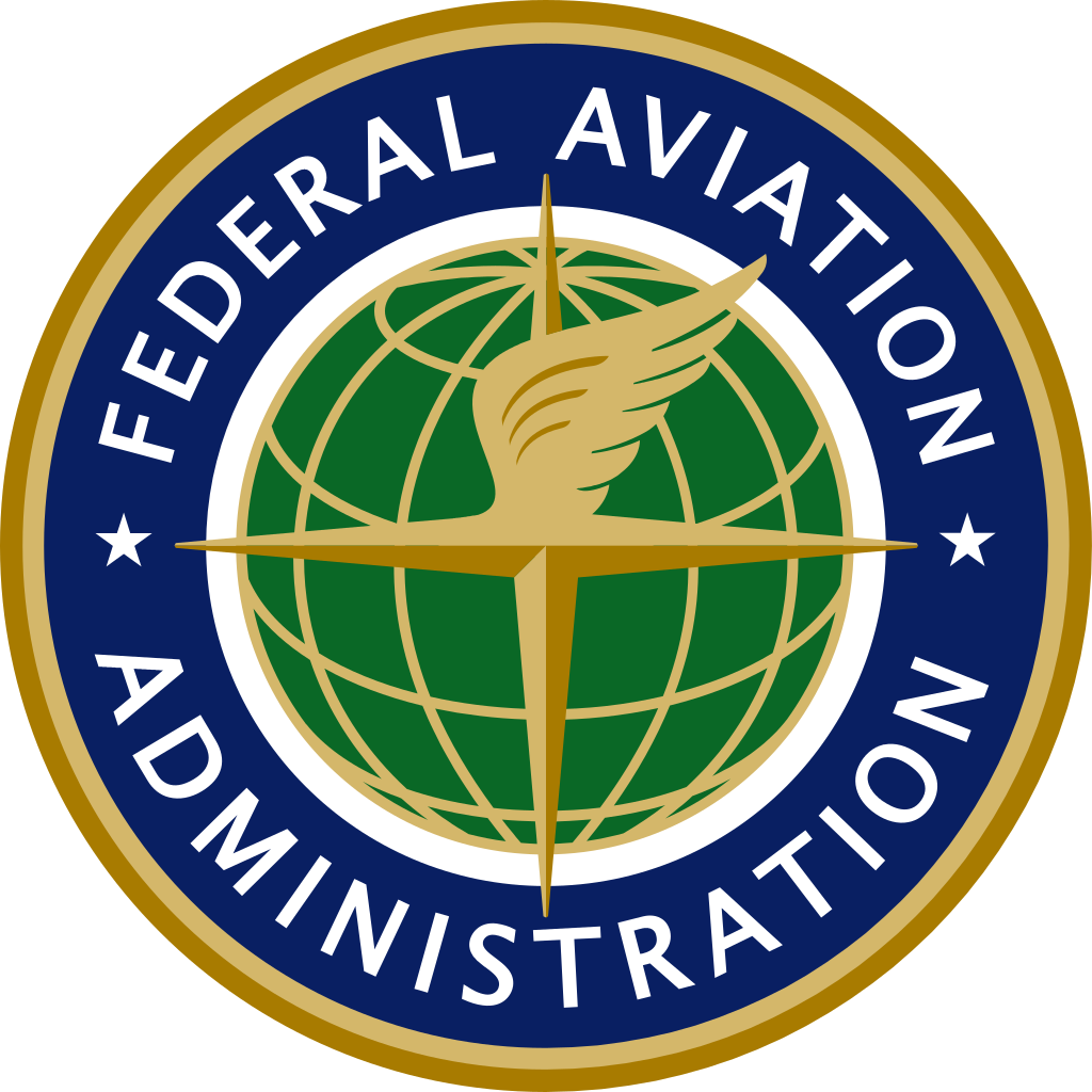 Official seal of the Federal Aviation Administration (FAA) with globe, compass, and wing.