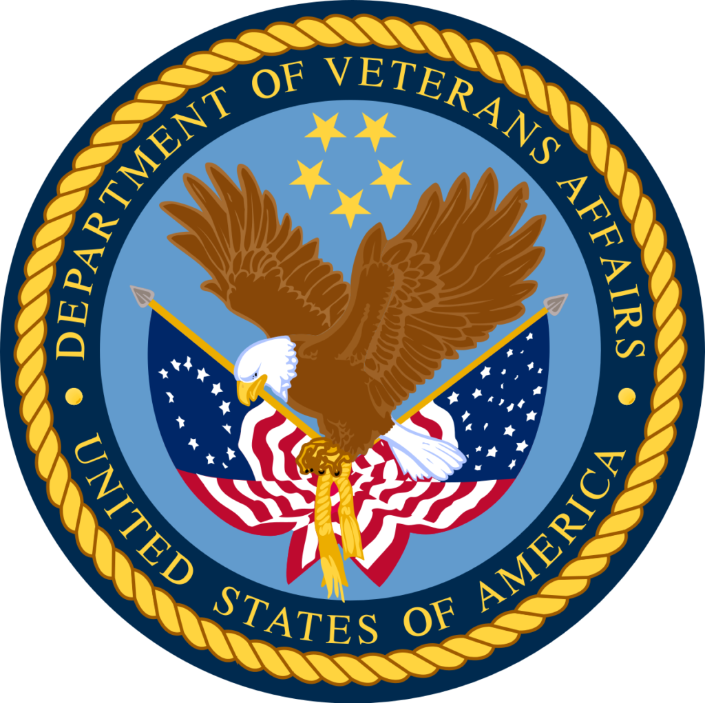 Seal of the Department of Veterans Affairs (VA) with a bald eagle, American flags, and stars.
