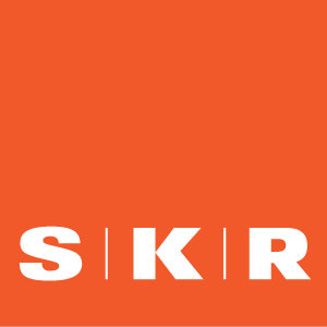 SKR letters logo in white on a solid orange background.